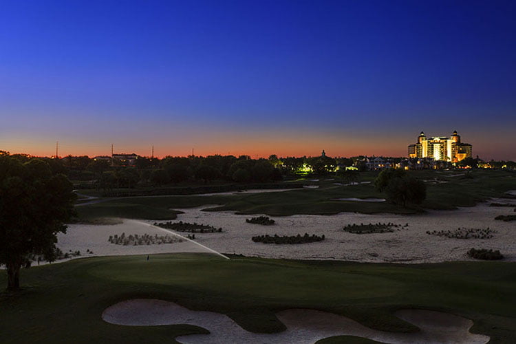 Sunset of Reunion Resort, Arnold Palmer Course, and the Grande